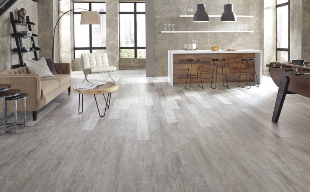 Modern Open-Concept Living Space with Professional LVP Flooring Services Modern open-concept living space featuring professional LVP flooring services with stylish, durable vinyl planks that enhance a contemporary interior design.