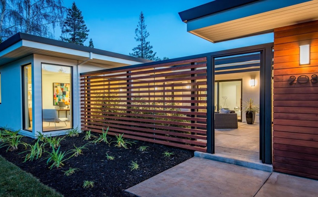 Modern horizontal slat fence installed at a contemporary home entrance, enhancing privacy and curb appeal with professional Fence Installation Services for residential properties. Modern horizontal slat fence installed at a contemporary home entrance, enhancing privacy and curb appeal with professional Fence Installation Services for residential properties.