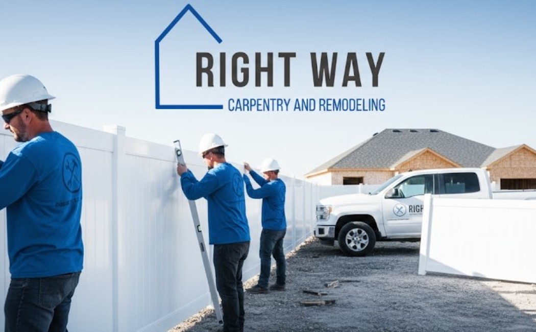 Team of workers installing a white vinyl fence at a residential property, representing professional Fence Installation Services by Right Way Carpentry and Remodeling.