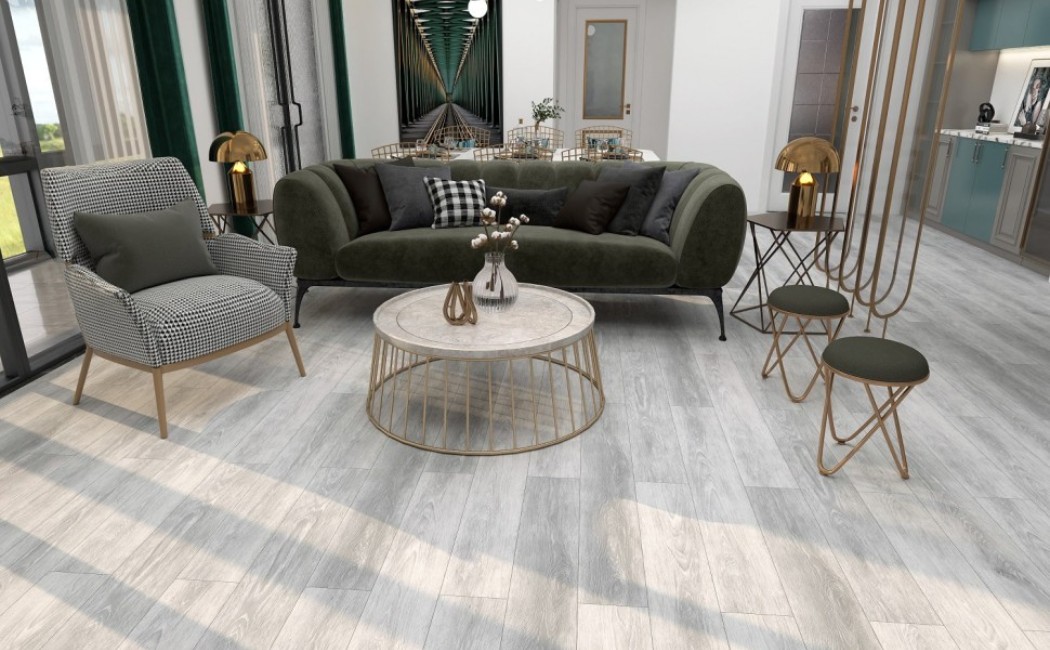 Stylish living room interior with green sofa and light wood-look floors installed by a professional LVP Flooring Company.